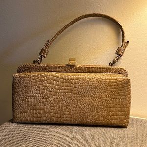 Alligator skin tan clutches